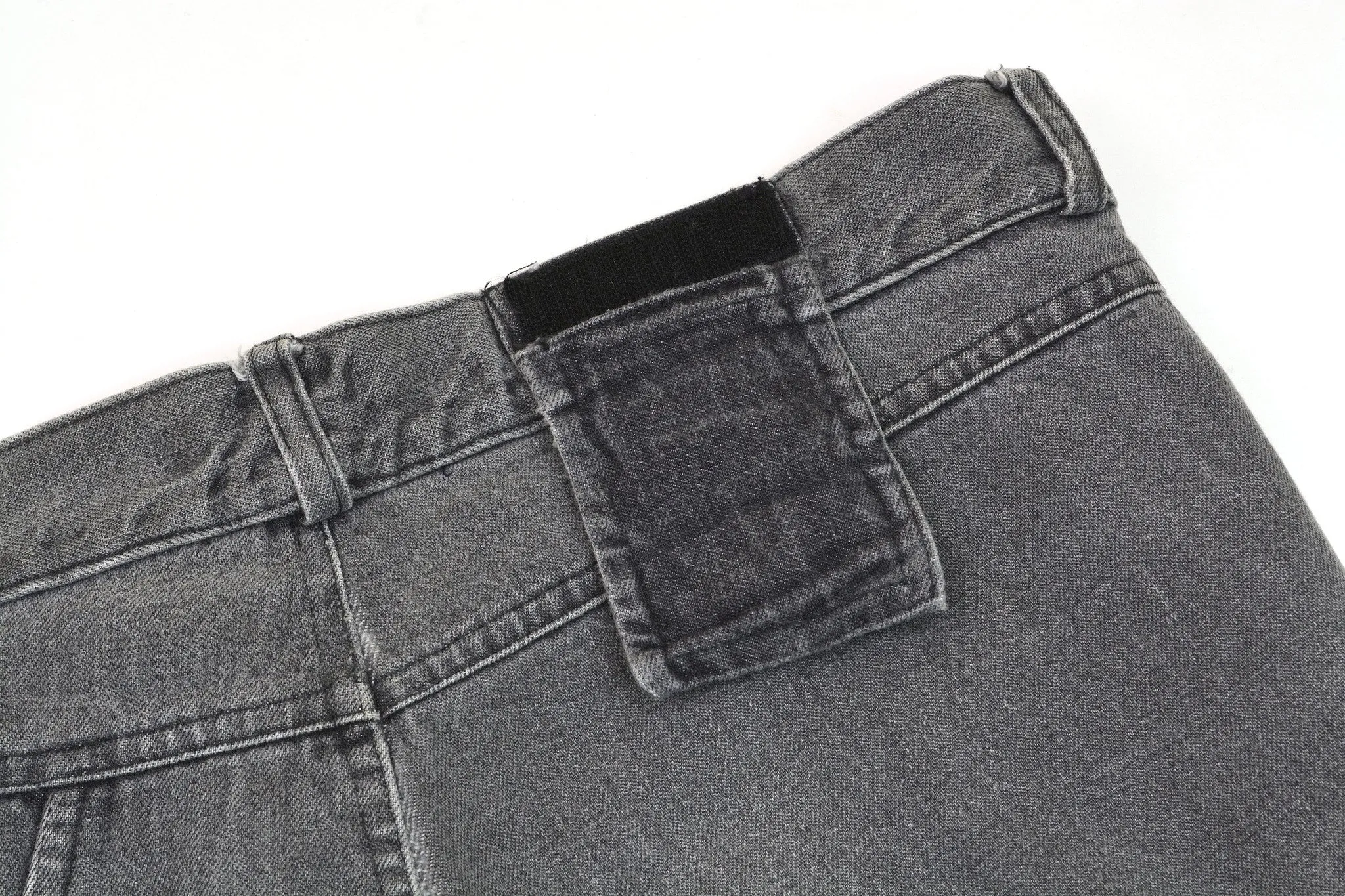 2005 Acid Washed Denim Asymmetric Spiral Jeans with Pocket Details