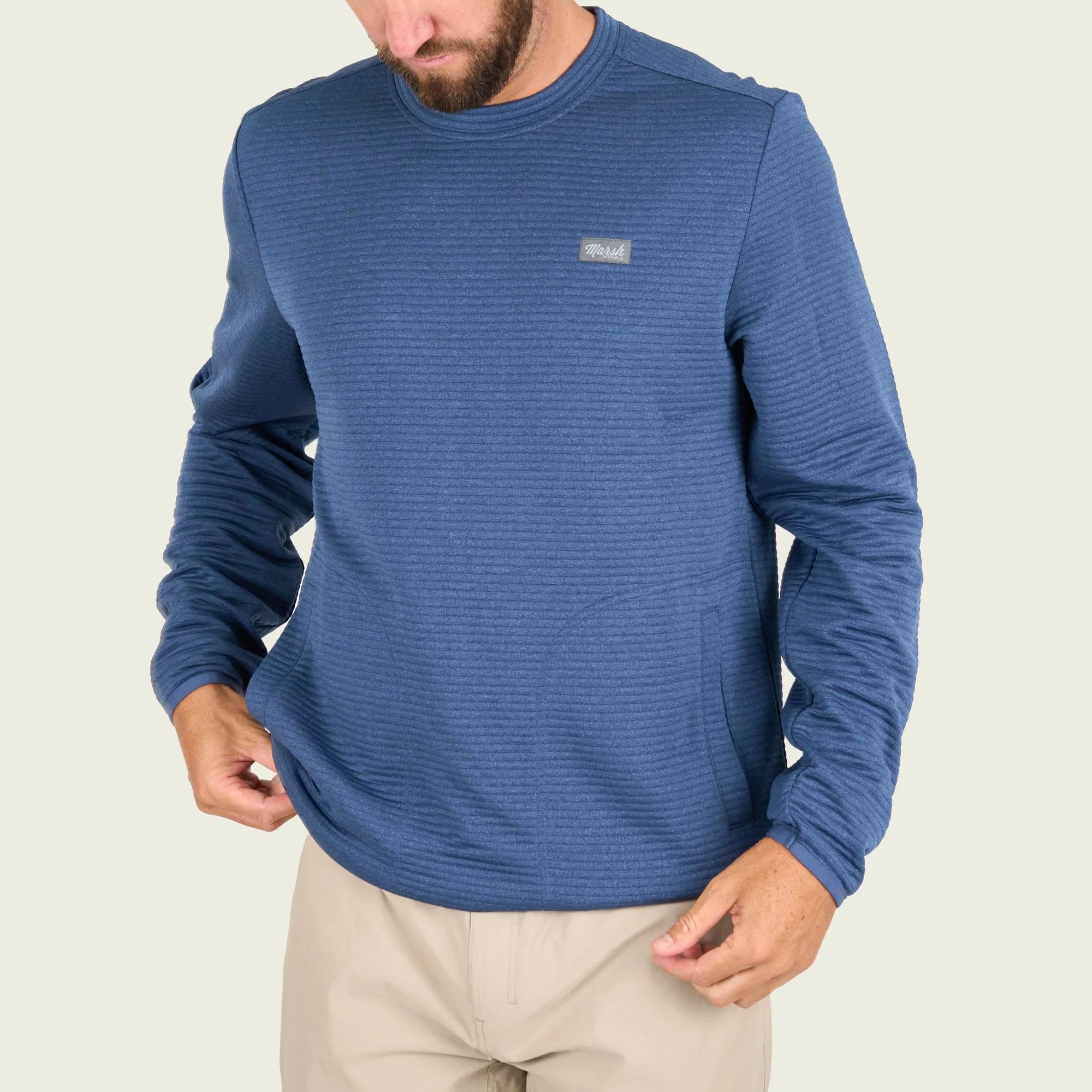 Certainly! To optimize the title for an e-commerce product, its important to make it descriptive and enticing while using relevant keywords. Heres an optimized version:

Mens High-Performance Sullivan Tech Fleece Pullover - Moisture-Wicking, Lightweight, Breathable

This title includes modifiers (High-Performance, Moisture-Wicking, Lightweight, Breathable) to highlight key features that may attract potential buyers.